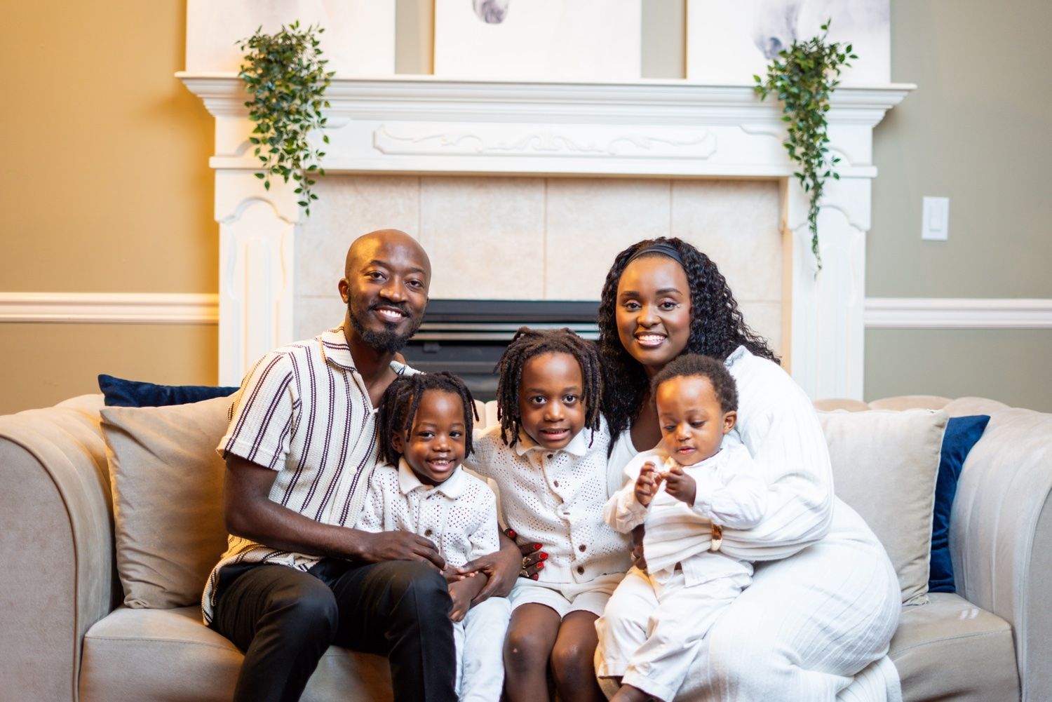 Pastors Ernest and Linda Dushime with their three children